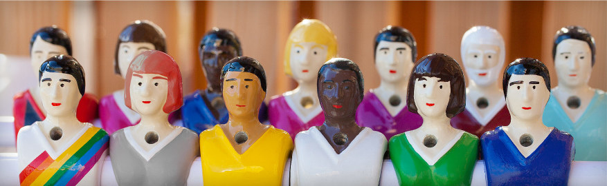 Male and female foosball players in different skin colours