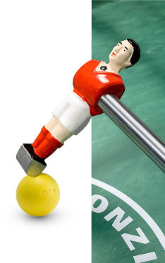 Bonzini foosball player with the yellow ITSF competition ball